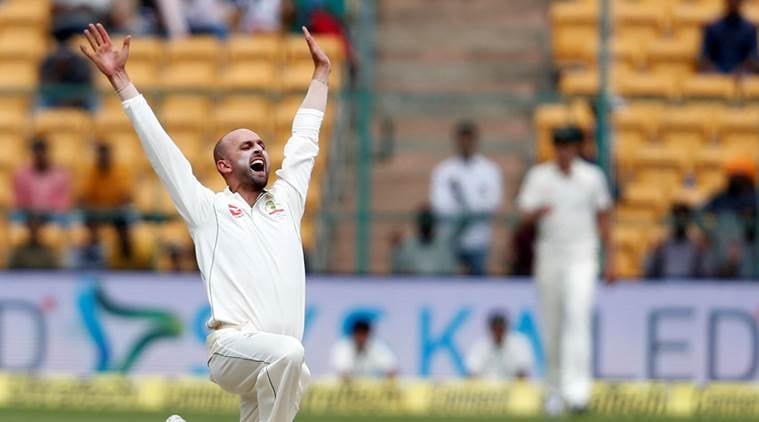 Cricket - India v Australia - Second Test cricket match - M Chinnaswamy Stadium, Bengaluru, India - 04/03/17. Australia's Nathan Lyon celebrates the wicket of India's captain Virat Kohli. REUTERS/Danish Siddiqui