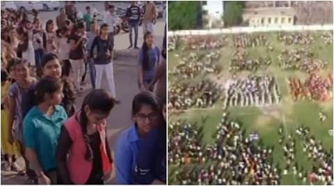 india guinness world record sweeping, 2000 people sweep together in Surat, many people sweep for guinness world record, indian express, indian express news