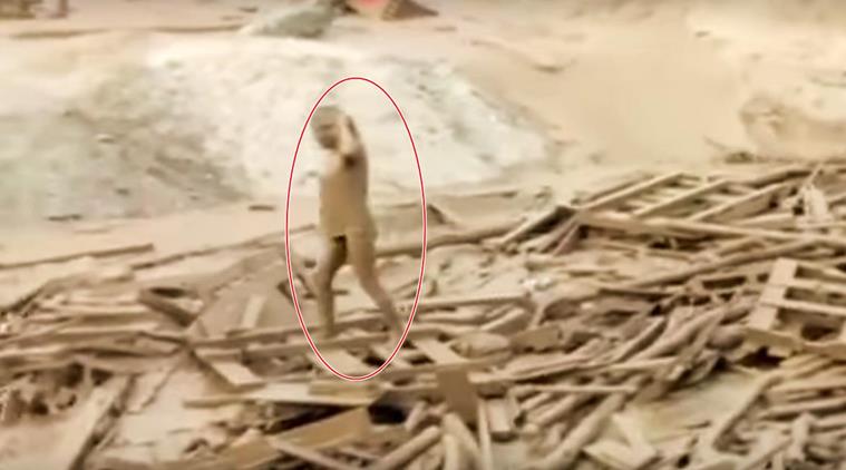 peru, peru woman, peru woman mudslide, woman stuck in mudslide, woman in mudslide video, peru woman video, indian express, indian express news