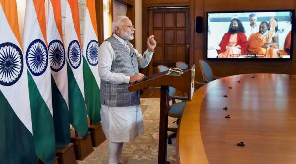 New Delhi: Prime Minister Narendra Modi addressing the inaugural function of Annual International Yoga Festival at Rishikesh, through video conferencing, in New Delhi on Thursday. PTI Photo/PIB(PTI3_2_2017_000097A)