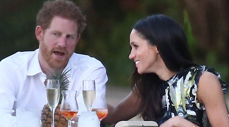 Meghan Markle and Prince Harry was photographed looking quite happy together while enjoying a conversation at their assigned table