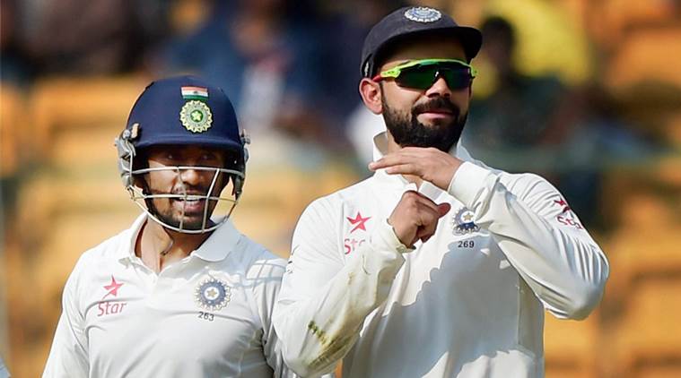 Bengaluru : India's Captain Virat Kohli asking a review during the Second day of the second test match between India and Australia at chinnaswamy stadium in Bengaluru on Sunday. PTI Photo by Shailendra Bhojak(PTI3_5_2017_000121A)