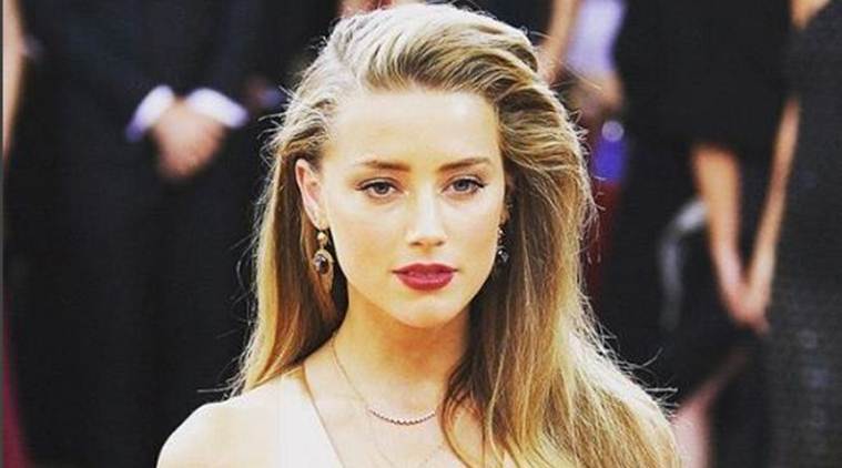 Amber Heard sues film producer over nude scenes | Hollywood News - The  Indian Express