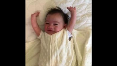 cute baby throws up arms, cute baby throws up arms in air, video of cute baby throwing arms in air, cute baby arms in air braveheart, braveheart, indian express, indian express news