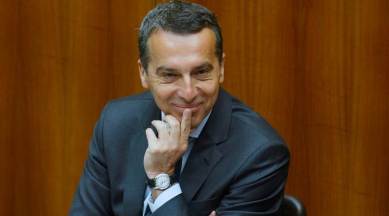 Austria's Chancellor Christian Kern smiles as he waits to deliver a speech during a session of the parliament in Vienna, Austria April 26, 2017. REUTERS/Heinz-Peter Bader