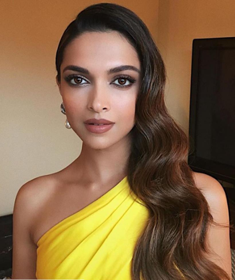 Poll: Is Deepika Padukone's hairstyle boring for red carpet? - Rediff.com