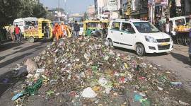 sanitation-worker-759 MCD Election results 2017, MCD poll results, MCD, BJP, bjp wins mcd, bjp wins, MCD vote counting, MCD results 2017, MC counting photos, Counting photos, BJP victory, BJP photos, Congress, AAP, Delhi news, Delhi , Latest MCD photos, Indian express photos,