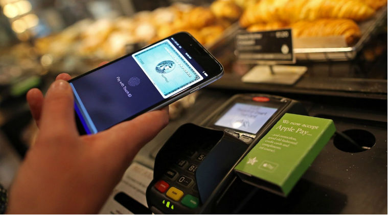 Apple Inc, Visa Inc, Universal Secure Registry, mobile payment partnership, infringes four patents, Apple Pay's debut, USR's patent, USR's partnership offer shunned, Apple Pay service, injunction on invention, technology, technology news