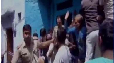 buffalo slaughter, aligarh buffalo slaughter, man thrashed for buffalo slaughter, man thrashed in aligarh, uttar pradesh cow slaughter, aligarh news, india news, latest news, indian express