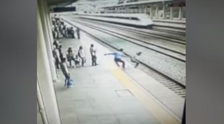 Watch Brave Railway Worker Saves Suicidal Woman From Jumping In Front Of The Train Trending