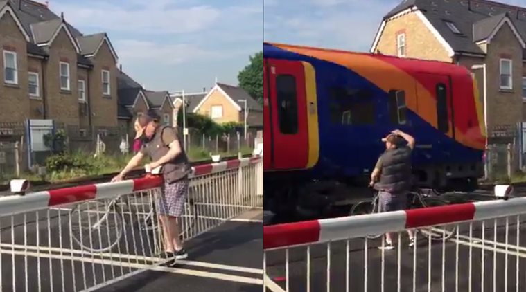 Watch Man In Hurry Almost Gets Hit By A Train While Trying To Cross The Railway Track