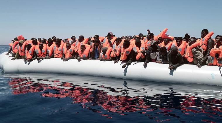 Image result for migrants on boats to italy