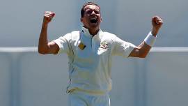 Australia's Peter Siddle celebrates after dismissing South Africa's Jean-Paul Duminy at the WACA Ground in Perth.