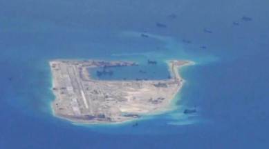 China building on new reef in S.China Sea, think tank says
