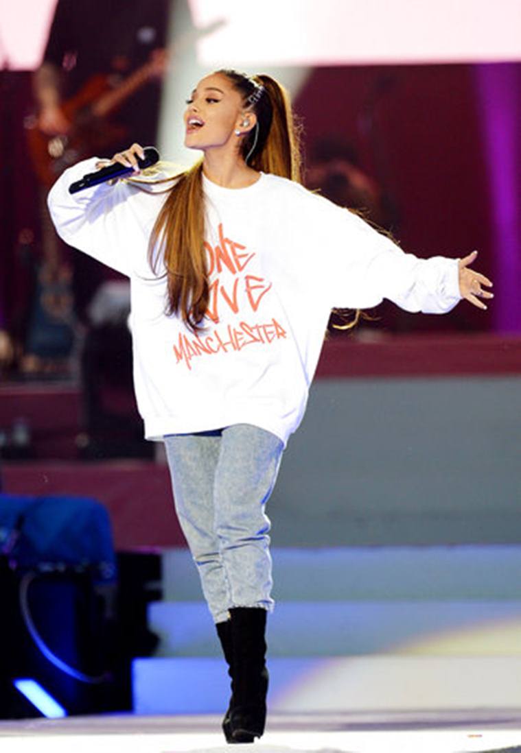 Ariana Grande returns to Manchester to honor victims with benefit ...
