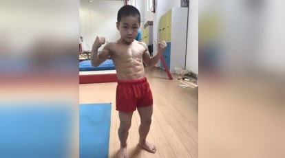 The Internet's going crazy over this 7-yr-old's 8-pack abs