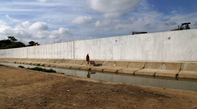 Ecuador, Ecuador Peru wall, flood prevention wall, Rafael Correa