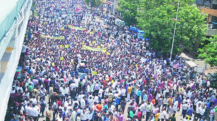 surat, textile strike, gst, cloth merchants, textile traders, mill labourers, gujarat, indian express