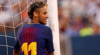 Brazilian football star Neymar, or Neymar Jr., poses as he arrives