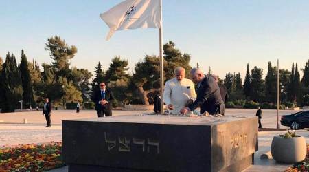 Jerusalem :  Prime Minister Narendra Modi with Israeli Prime Minister Benjamin Netanyahu visit the tomb of Theodor Herzl, in Jerusalem, Israel on Tuesday.  PTI Photo(PTI7_4_2017_000303B)