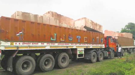 A truck laden with stones in Ayodhya on Wednesday. Express