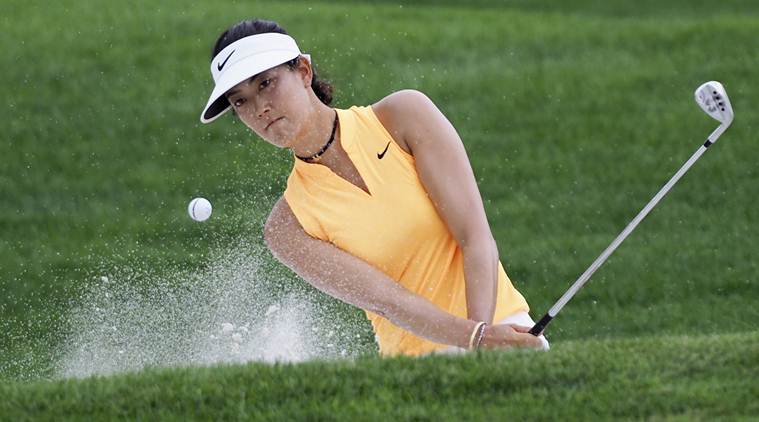 Beaming Michelle Wie pushes through neck injury to finish round at US ...