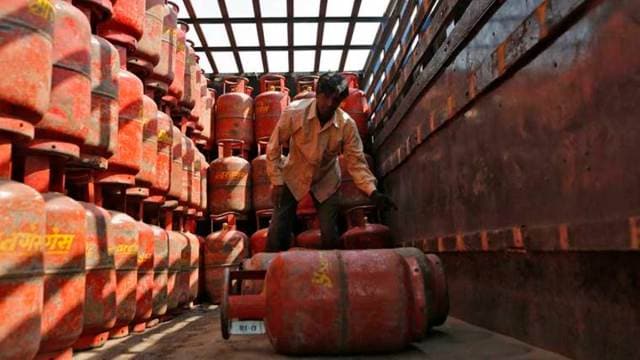 A worker unloads LPG cooking cylinders from a supply truck outside a distribution centre in Ahmedabad (Representational) 