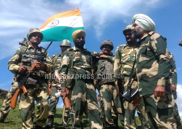 Keep the flag flying high: Indian Army soldiers patrol Line of Actual ...