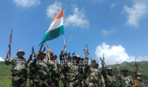 Keep the flag flying high: Indian Army soldiers patrol Line of Actual ...