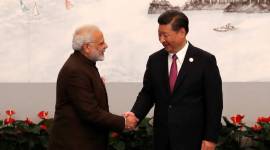Indian Prime Minister Narendra Modi and Chinese President Xi Jinping shake hands before the welcoming banquet for the BRICS Summit, in Xiamen BRICS Summit 2017, BRICS Summit, India China, terrorism, Lashkar, Jaish, Xiamen declaration, Pakistan terrorism, Beijing, Xi Jinping, Modi, indian express