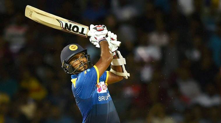 Sri Lanka's Dilshan Munaweera leaves the field after dismissal