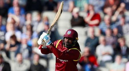 Cricket - England vs West Indies - First One Day International - Emirates Old Trafford, Manchester, Britain - September 19, 2017    West Indies’ Chris Gayle hits a six   Action Images via Reuters/Jason Cairnduff