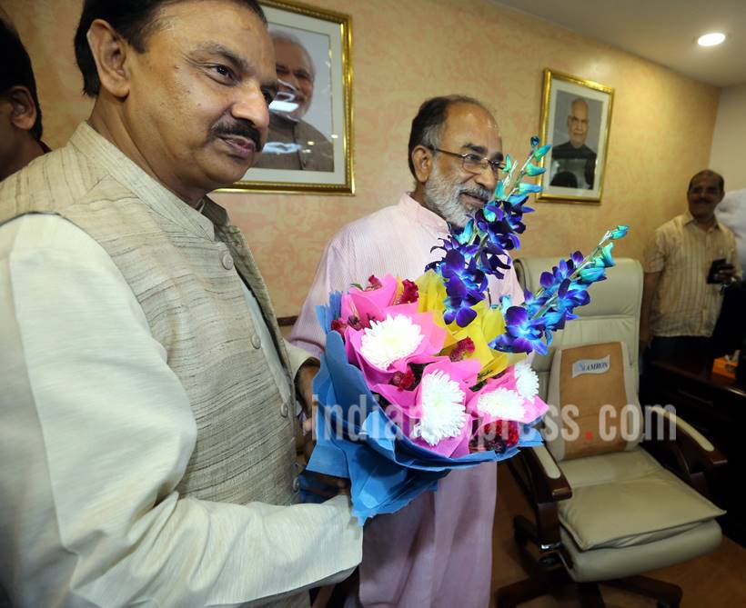 cabinet reshuffle photos, taking charge photo, cabinet reshuffle, mahesh sharma, hardeep singh puri, hardip singh purim, Alphons Kannanthanam, modi government, modi cabinet, indian express, india news,
