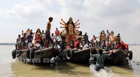 durga puja, durga puja 2017, kolkata durga puja, durga puja unique rituals, durga idold river transportation, durga puja themes, durga puja unique theme, 2017 durga puja photos, bengal durga puja photos, durga pujo images, durga puja celebrations,
