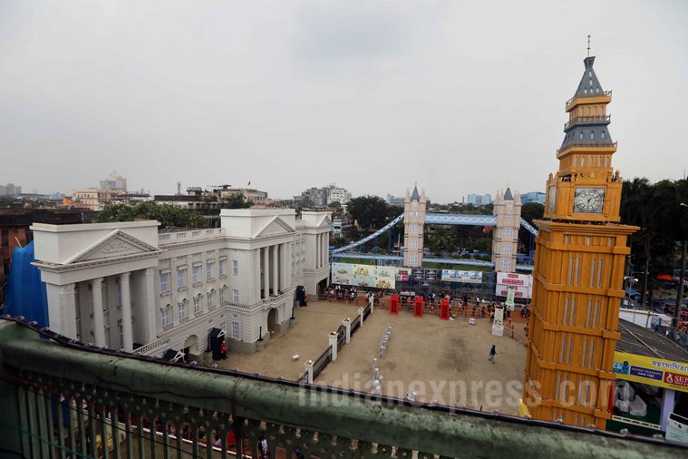 Durga Puja, Durga puja 2017, gold saree durga puja, durga idol gold sari, santosh mitra square, kolkata pandal gold sari idol, designer clothes Kolkata pujo pandal, kolkata unique themes, india news, kolkata news, durga puja news, durga puja photos,