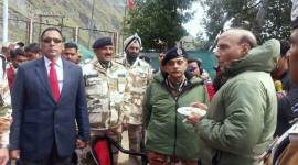 Home Minister Rajnath Singh interacts with ITBP personnel at the border outpost in Mana, Uttarakhand on Friday. PTI