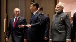 From left, Russian President Vladimir Putin, Chinese President Xi Jinping, and Indian Prime Minister Narendra Modi arrive for the Dialogue of Emerging Market and Developing Countries in Xiamen, in southeastern China’s Fujian Province no alt set