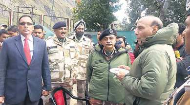 Home Minister Rajnath Singh interacts with ITBP personnel at the border outpost in Mana, Uttarakhand on Friday. PTI