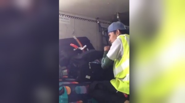 airline staff opening bags, airline staff opening passenger bags,Manipur Chief Minister N Biren Singh, CM shares airline staff, Indian express, Indian express news