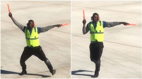 man dance while giving signals to pilot, aircraft marshalling, dancing ground personnel, aircraft signal dance, aircraft signalling, indian express, indian express news