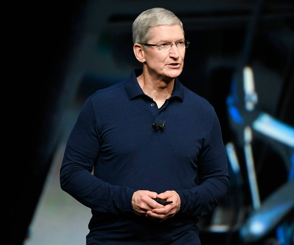 Apple, Tim Cook, Emmanuel Macron, Cook-Macron meeting, EU tech taxes, Apple French suppliers, tech companies tax, Macron startup nation, Macron EU summit, Ireland Apple fine, Macron tech giant meetings