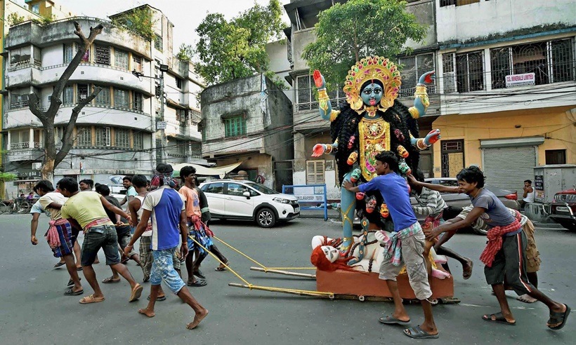 kali puja, kali puja photos, kali puja images, diwali photos, deepavali photos, diwali kali puja, kolkata kali puja, brngal kali puja photos, kalighat kali, dakshineswar kali temple, indian festivals, indian express