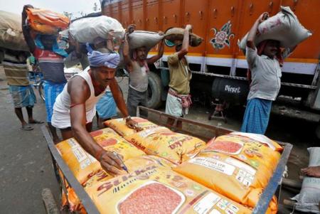 Assam govt, Assam govt on loading unloading wages, Assam loading unloading wages, Minimum Wages Act, assam news, indian express news