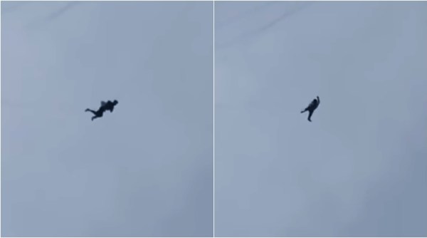 china man viral video, china viral videos, china man hanging on a ope viral video, china man hanging viral video, china man with no money to pay hotel bill hangs from rope, indian express, indian express news