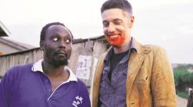 Nabwana Isaac GG and Alan Hofmanis in Wakaliwood no alt set