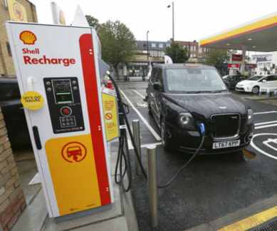Shell, electric vehicles, Shell electric charging point, zero-emission vehicles, NewMotion, Shell petrochemicals, EV registrations, EV goals, Paris Climate Agreement, London transport authorities, Total, gasoline-powered vehicles, Royal Dutch Shell