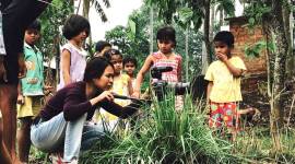 Rima Das with her young cast and crew at the shoot