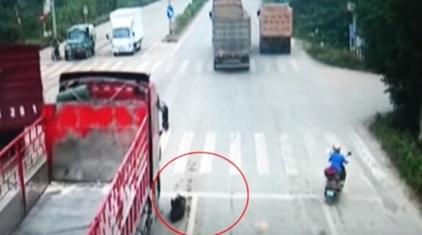china man run over by truck, viral videos, viral videos on youtube, best trending videos, china man narrow escape from getting run over by truck, china man narrow escape goes viral, indian express, indian express news