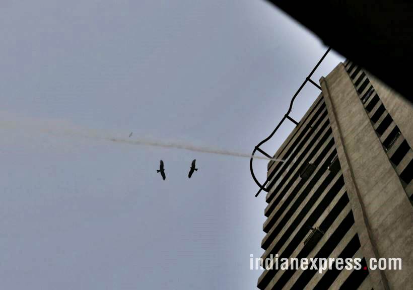 delhi pollution photos, ito water spray photos, water sprayed from building at ito pics, ito water sprinkled pictures, indian express