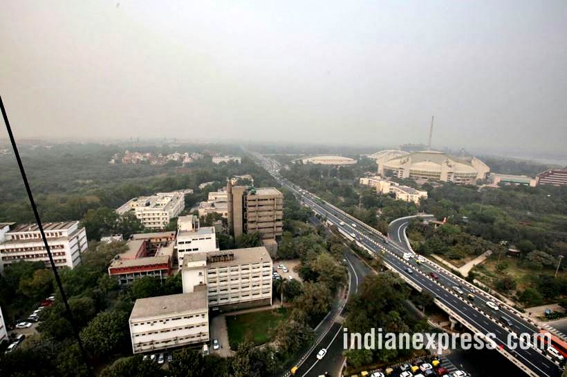 delhi pollution photos, ito water spray photos, water sprayed from building at ito pics, ito water sprinkled pictures, indian express